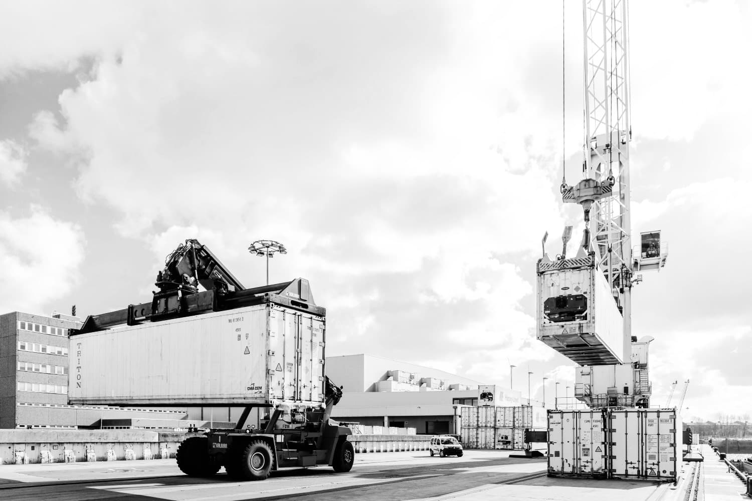 Reachstacker carrying a container in a port terminal